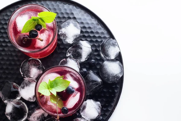 Red drink with basil and berries top view — Stock Photo, Image