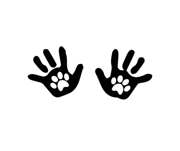 Černá silueta dětské ruky tiskne s zvířecí pawprints insid — Stockový vektor