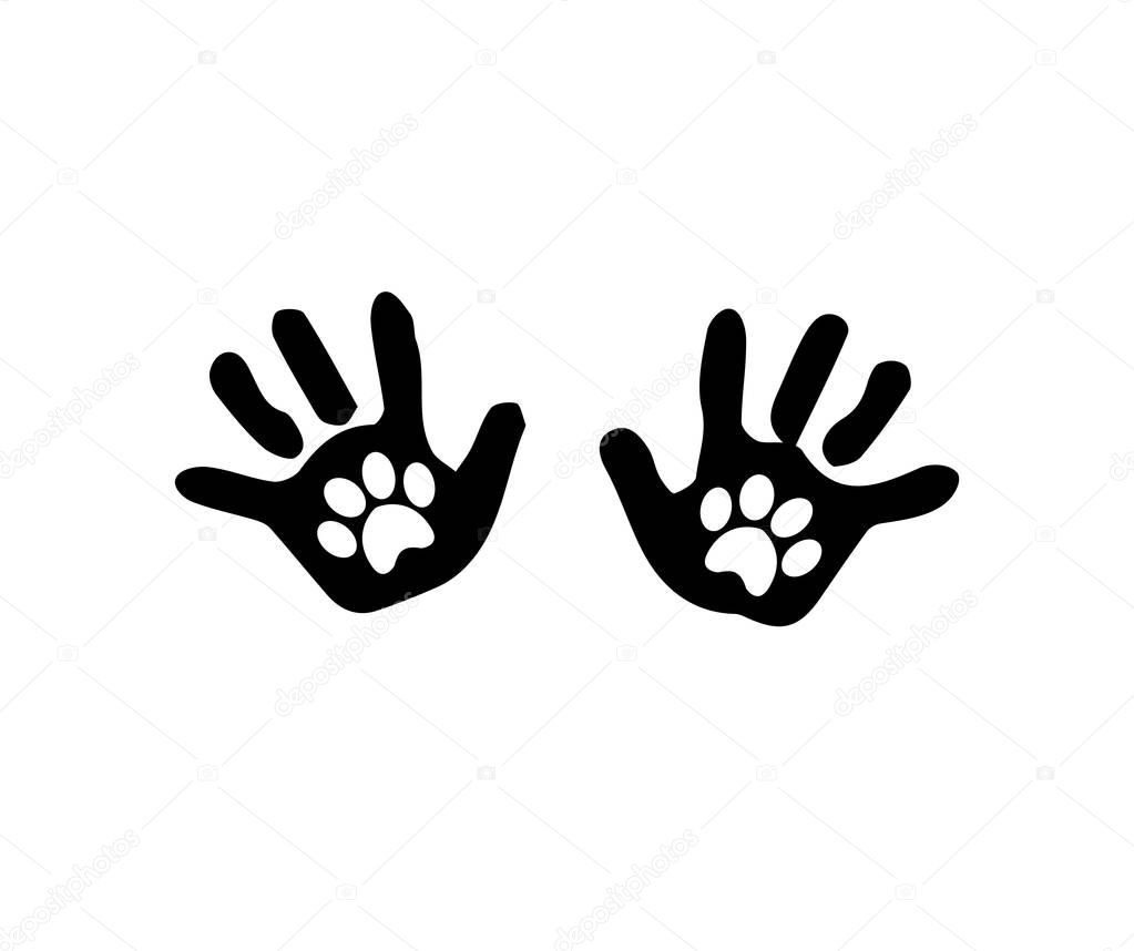 Black silhouette of baby hand prints with animal pawprints insid