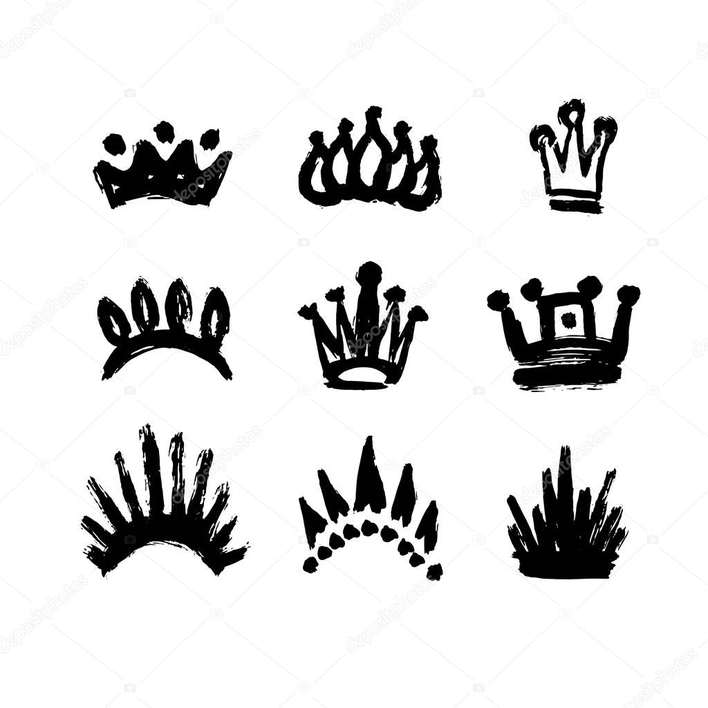 Set of crowns drawn by hand. Set texture strokes thick paint in the form of a crown isolated on white background. Grunge, sketch, graffiti. Isolated black icons, logos, symbols. Vector illustration.