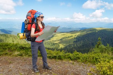 hiker with map clipart