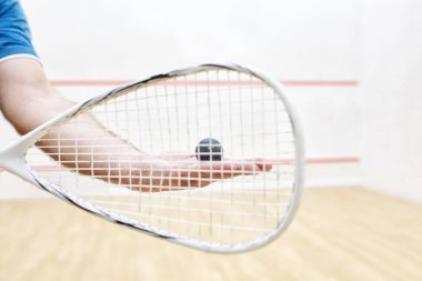 player with squash ball and racket clipart