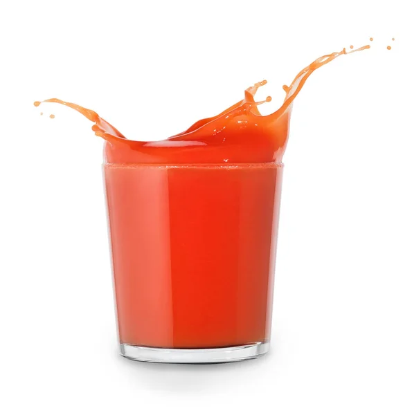 Vidro de suco de tomate com salpicos — Fotografia de Stock