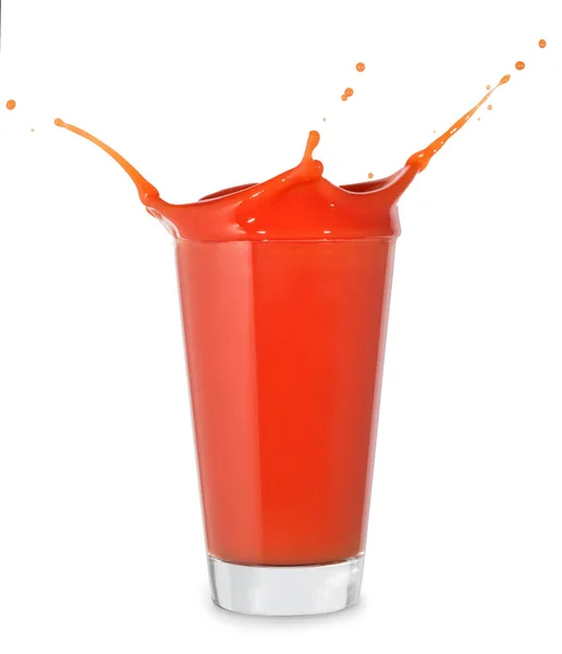 Tomato juice with splash in big glass — Stock Photo, Image