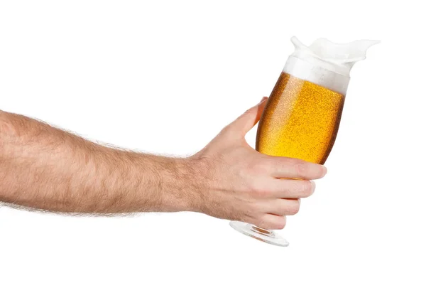 Hand with glass of splashing beer — Stock Photo, Image