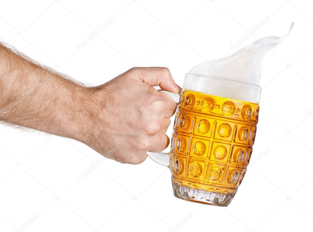 hand with mug of splashing beer