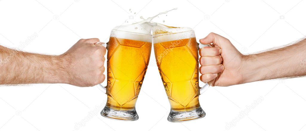 hands with beer mugs making toast