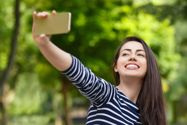 Girl taking selfie photo Stock Picture