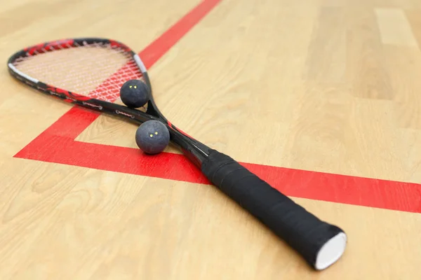 Equipamento de racquetball no campo — Fotografia de Stock