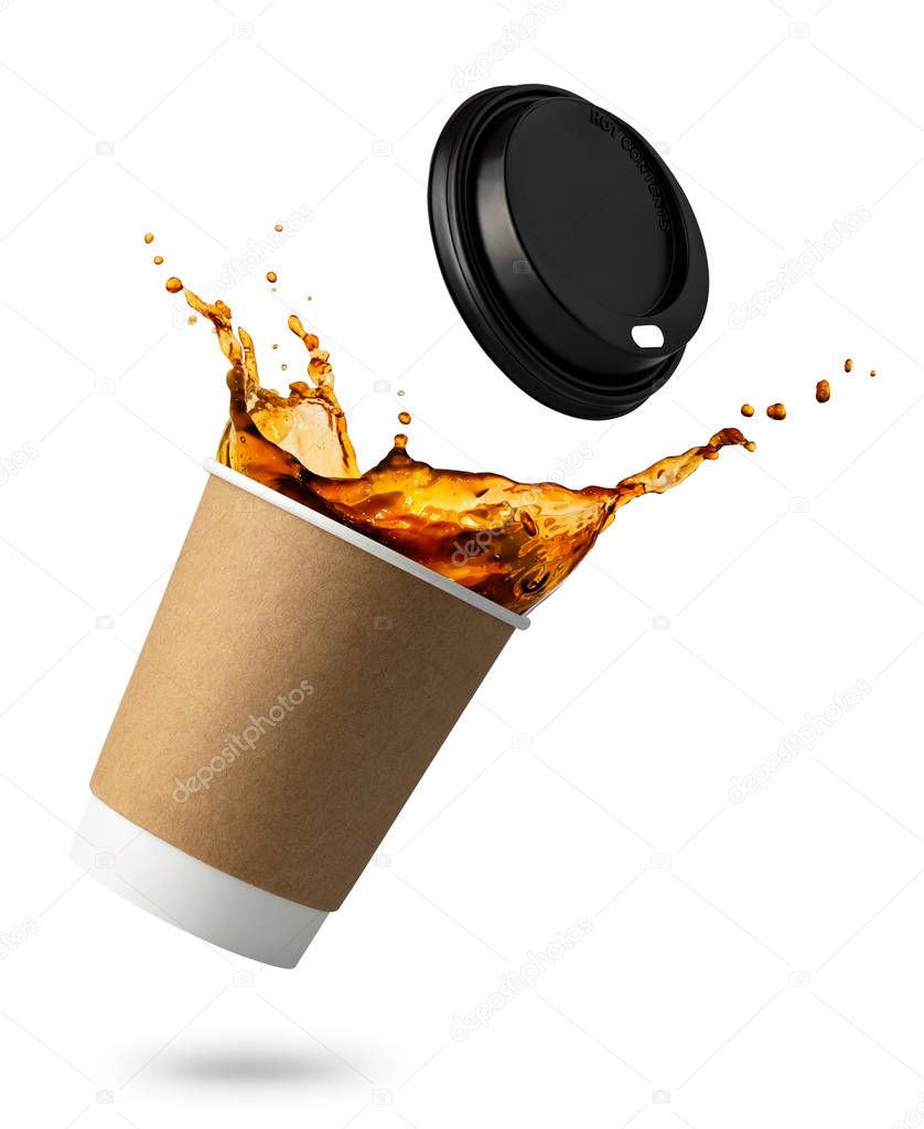 falling disposable cup with coffee splash