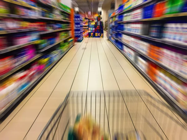 Abstract blurry supermarket interior retail and shopping mall. Concept consumism background