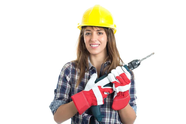 Construtor jovem atraente com ferramenta de broca feliz por um bom trabalho. Isolado sobre fundo branco . — Fotografia de Stock