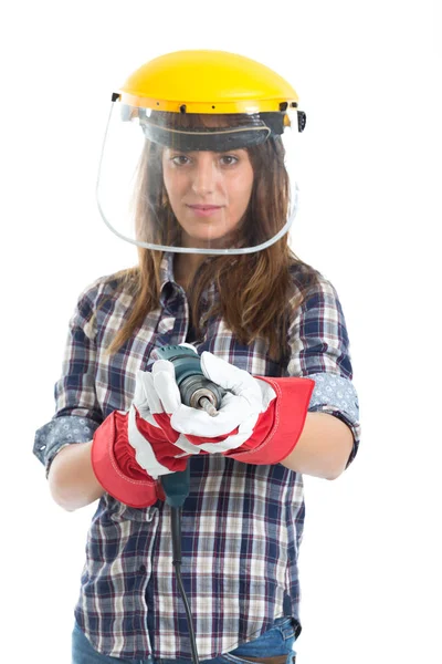 Atractiva mujer joven constructora con herramienta de perforación feliz por el buen trabajo. Aislado sobre fondo blanco . — Foto de Stock