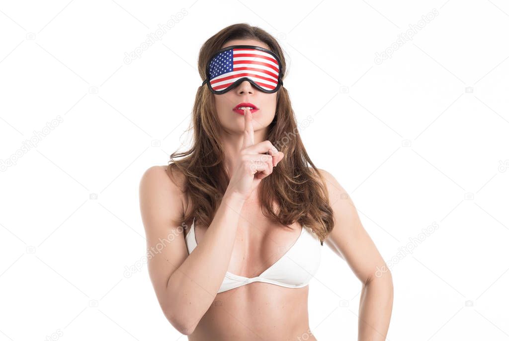 Young woman wearing eyemask. American Dream concept. Isolated on white background.
