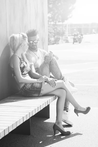 Portrait Handsome Couple Casual Clothing Sunglasses Sitting Wood Bench Joyful — Stock Photo, Image