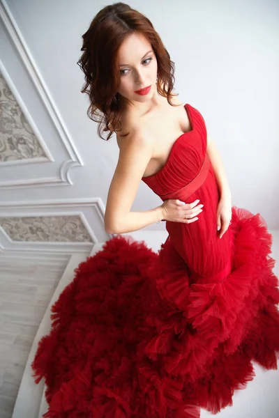Beauty Brunette model woman in evening red dress. Beautiful fash — Stock Photo, Image