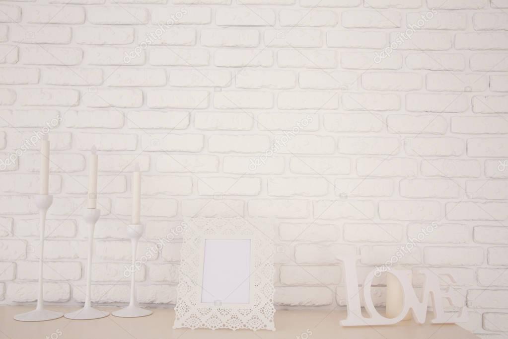 Decoration Items Placed On Top Of The Fireplace Which Are Scente