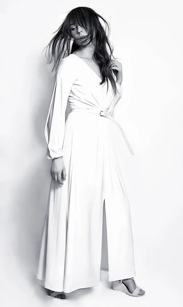 Beautiful fashion girl in white long dress — Stock Photo, Image
