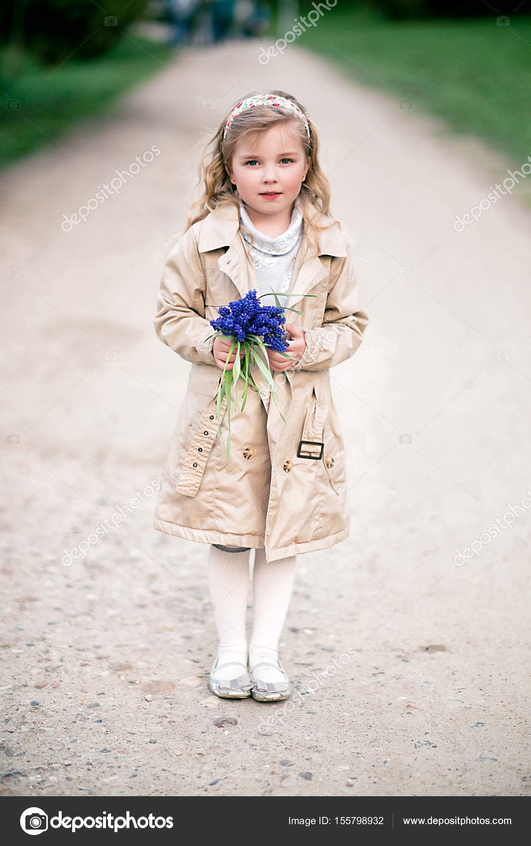 Little Happy Girl With Flowers Stock Photo Image By C Ribalka