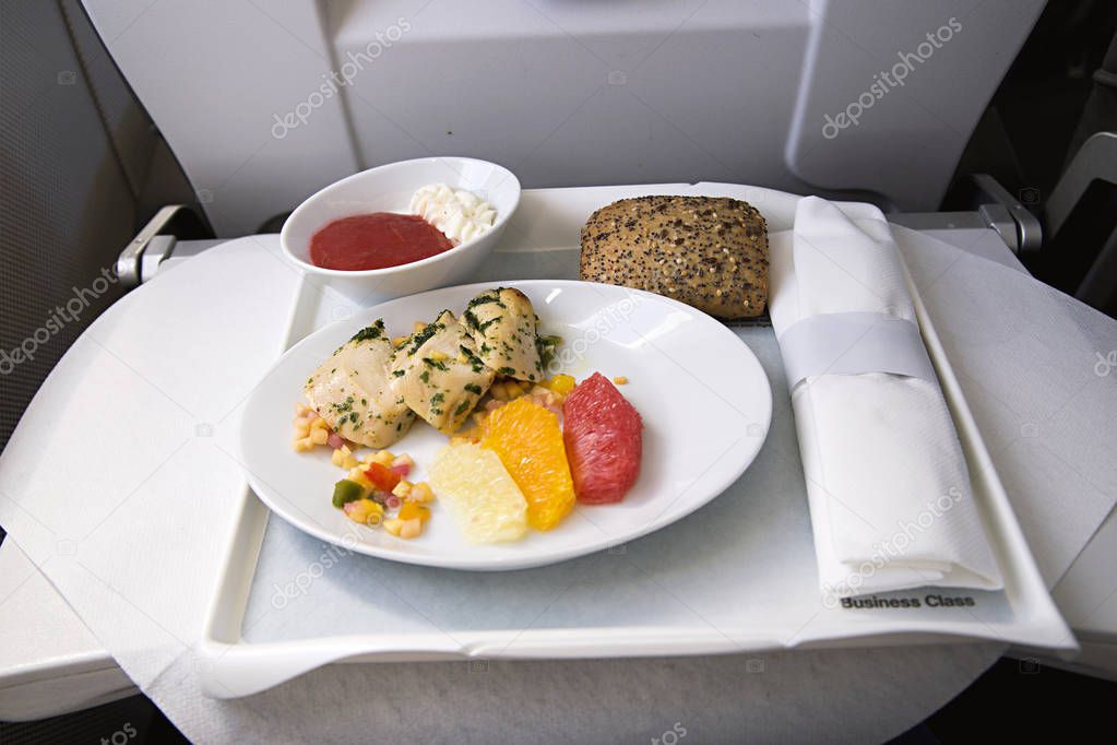 Lunch in the business class on board the aircraft