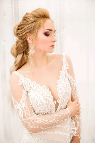 Portrait of a bride on a white background — Stock Photo, Image