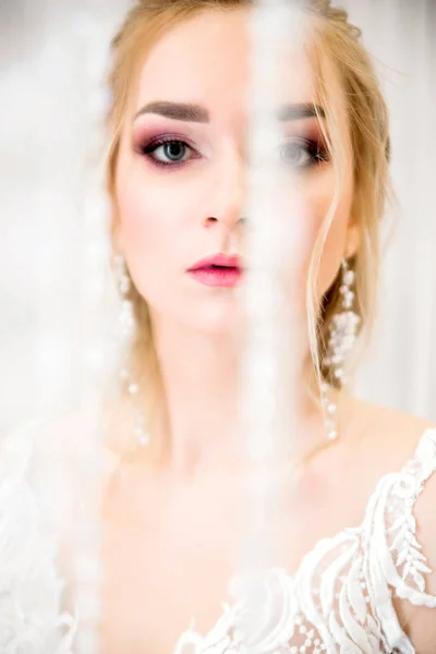 Portrait of a bride on a white background — Stock Photo, Image