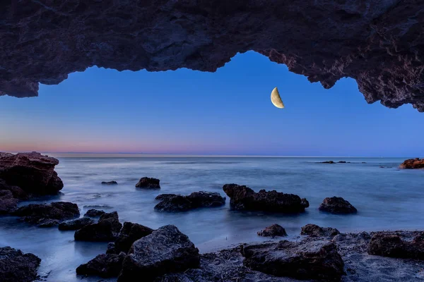 The sea from a cave at night — Stock Photo, Image