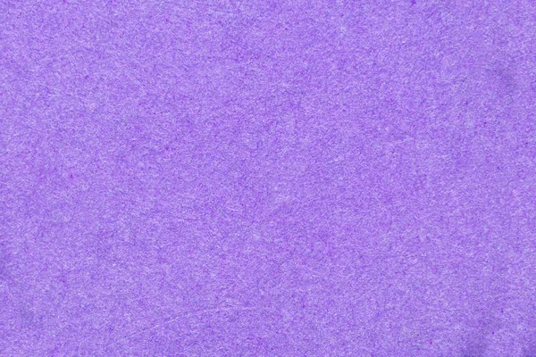 Um fundo com uma textura de uma cor violeta — Fotografia de Stock