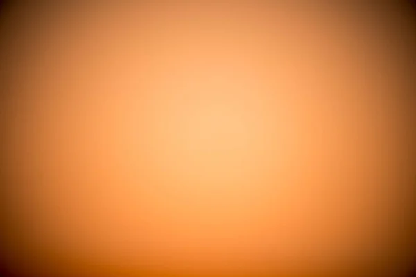 Um fundo com uma textura laranja — Fotografia de Stock