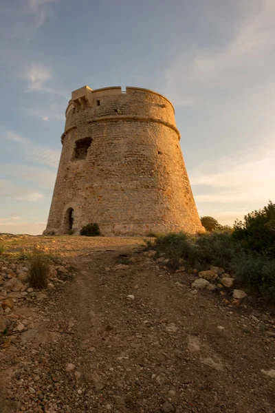 Medieval tower of Sal Rossa at sunrise in Ibiza — Stock Photo, Image