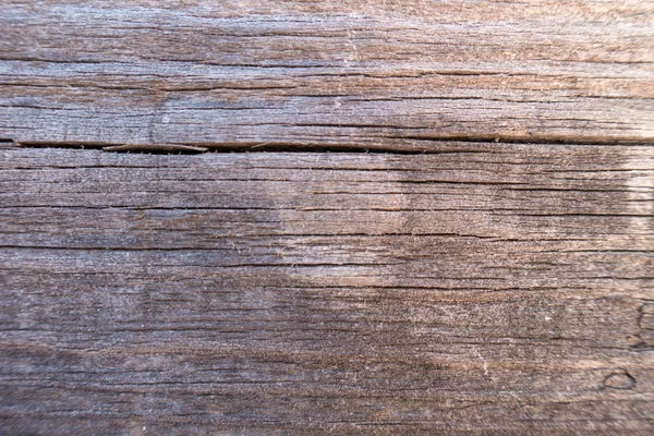 Ein dunkler Holzhintergrund von brauner Farbe — Stockfoto