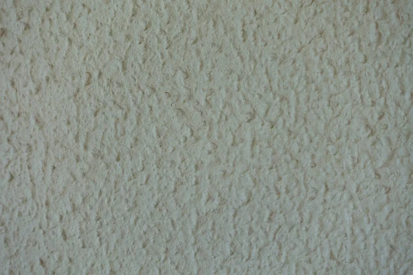 Um fundo de pedras de uma cor branca — Fotografia de Stock