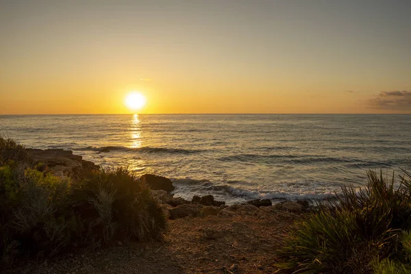 日の出に海のオロペサ海岸 — ストック写真