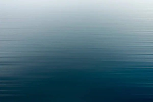 Um fundo abstrato de uma cor azul — Fotografia de Stock