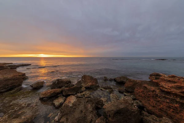 Salida del sol en la playa de la renega en Oropesa — Foto de Stock