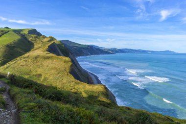 The coast of Zumaia on a clear day clipart