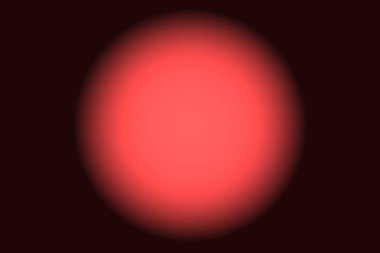 Ortasında renkli bir ışık olan siyah bir arkaplan.