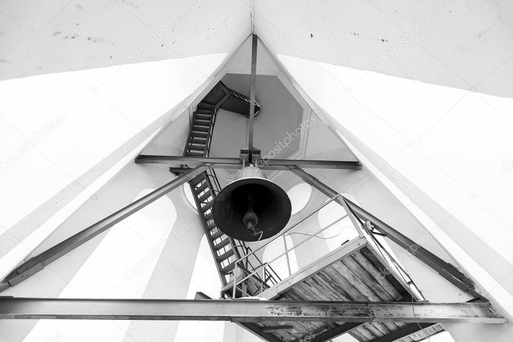 belltower in church. type of a bell from below.