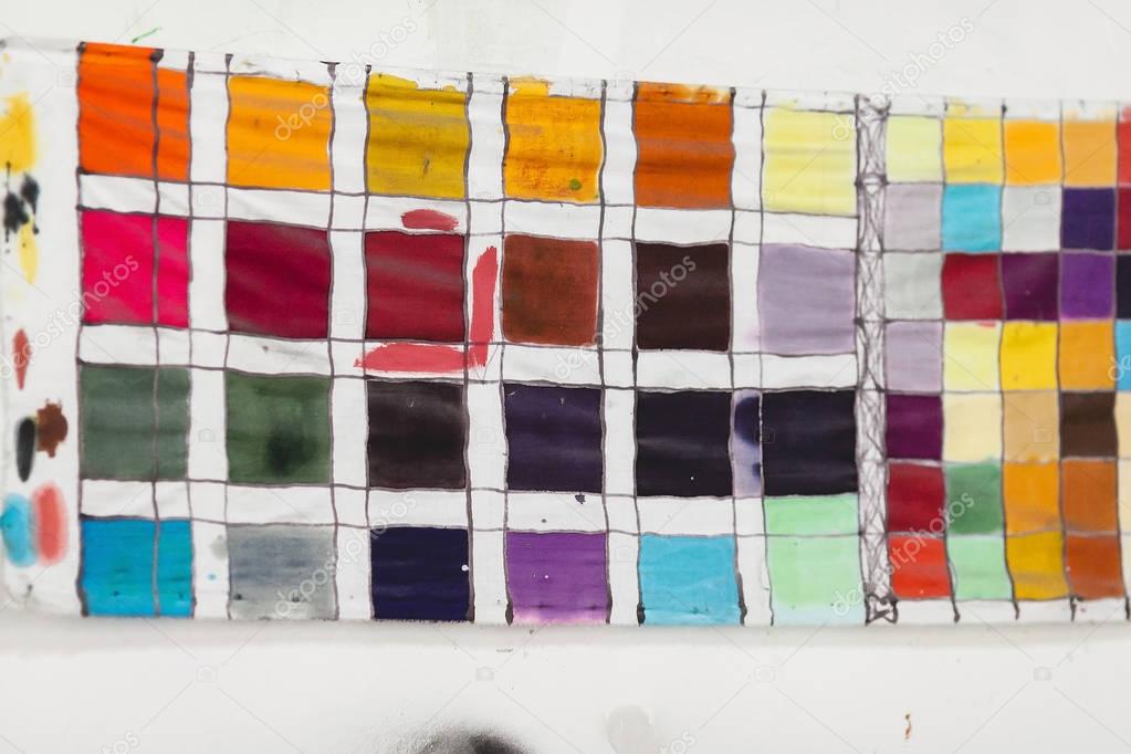 color palette. the table of shades of paints on fabric. color schemes at art school. range of colors.