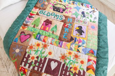 Patchwork yorgan arka plan olarak bir parçası. El yapımı