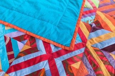 Patchwork yorgan arka plan olarak bir parçası. El yapımı