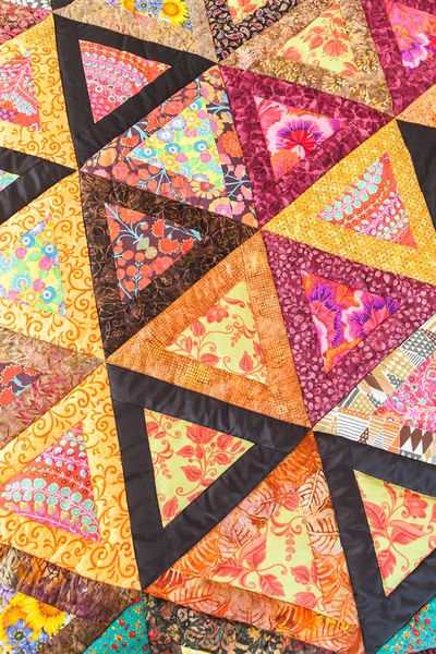 Patchwork quilt. Part of patchwork quilt as background. Handmade. Colorful blanket.