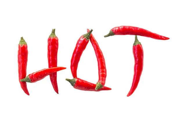 Red hot chili peppers, populära kryddor koncept - dekorativa mönster av liggande paprika med ordet Hot, gjord av röda hoade Chilipeppar på vit bakgrund, ovanifrån, platta lay. — Stockfoto