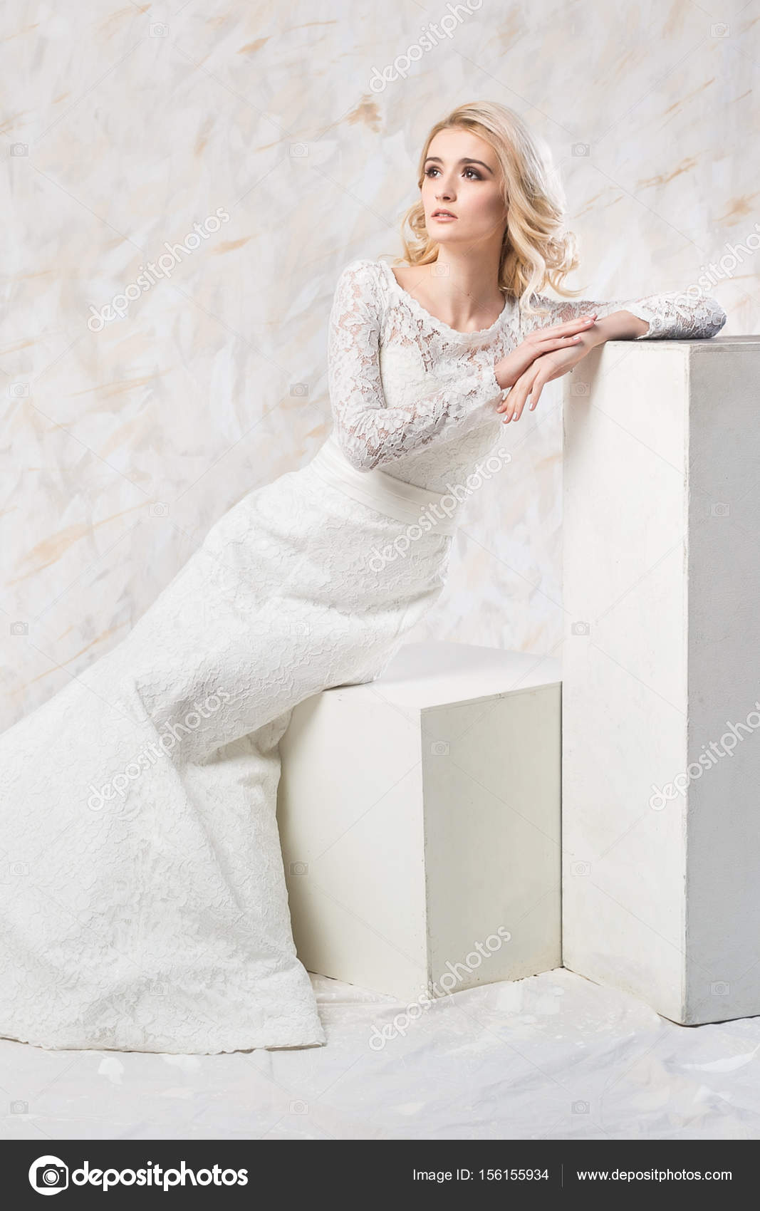 A Woman in White Bridal Gown Standing while Looking Over Shoulder · Free  Stock Photo
