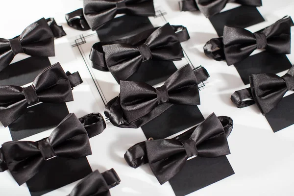Black bowtie. Black bowtie on a white background. Dress code party. — Stock Photo, Image