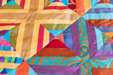 iplik, dikiş, el yapımı kavramı. bir kurucu eski bir battaniye üzerinde sonsuz yinelenen bir süs iki bölge üzerinde her biri birer bölünmüş bireysel asit renkli gölge vardır