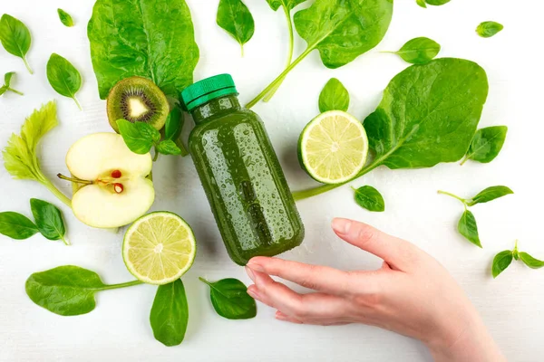 Woman Hand Holds Her Fingertips Bottle Green Detox Wich Surrounded — Stock Photo, Image