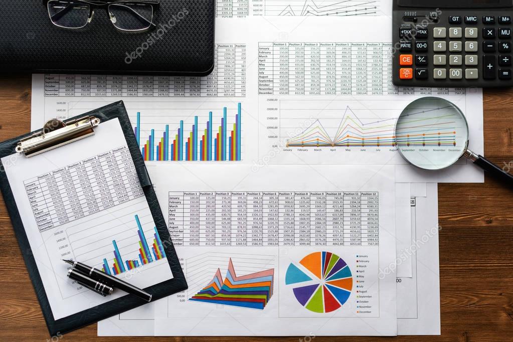 Financial printed paper charts, graphs and diagrams. Business and finance.