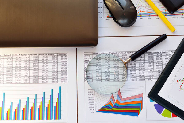 Financial printed paper charts, graphs and diagrams