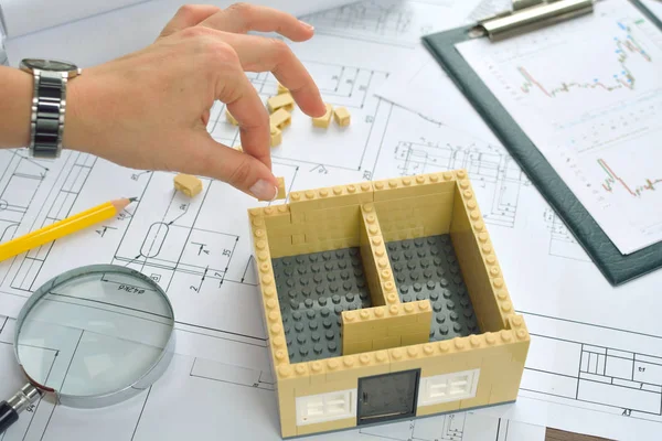 Disposición de la casa en los dibujos de fondo. Concepto de construcción. —  Fotos de Stock